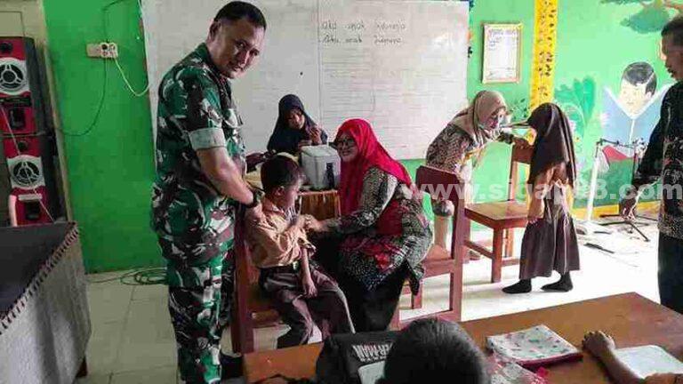 Babinsa Koramil 0826-03 Proppo Dampingi Kegiatan Bias Di Sdn Jambaringin 1