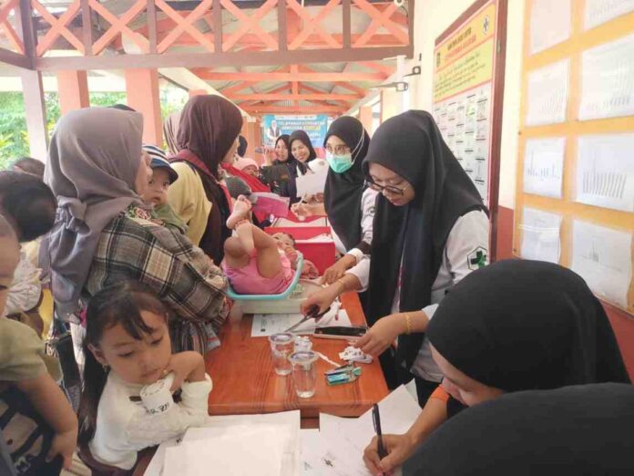 Puskesmas Arjasa layani balita